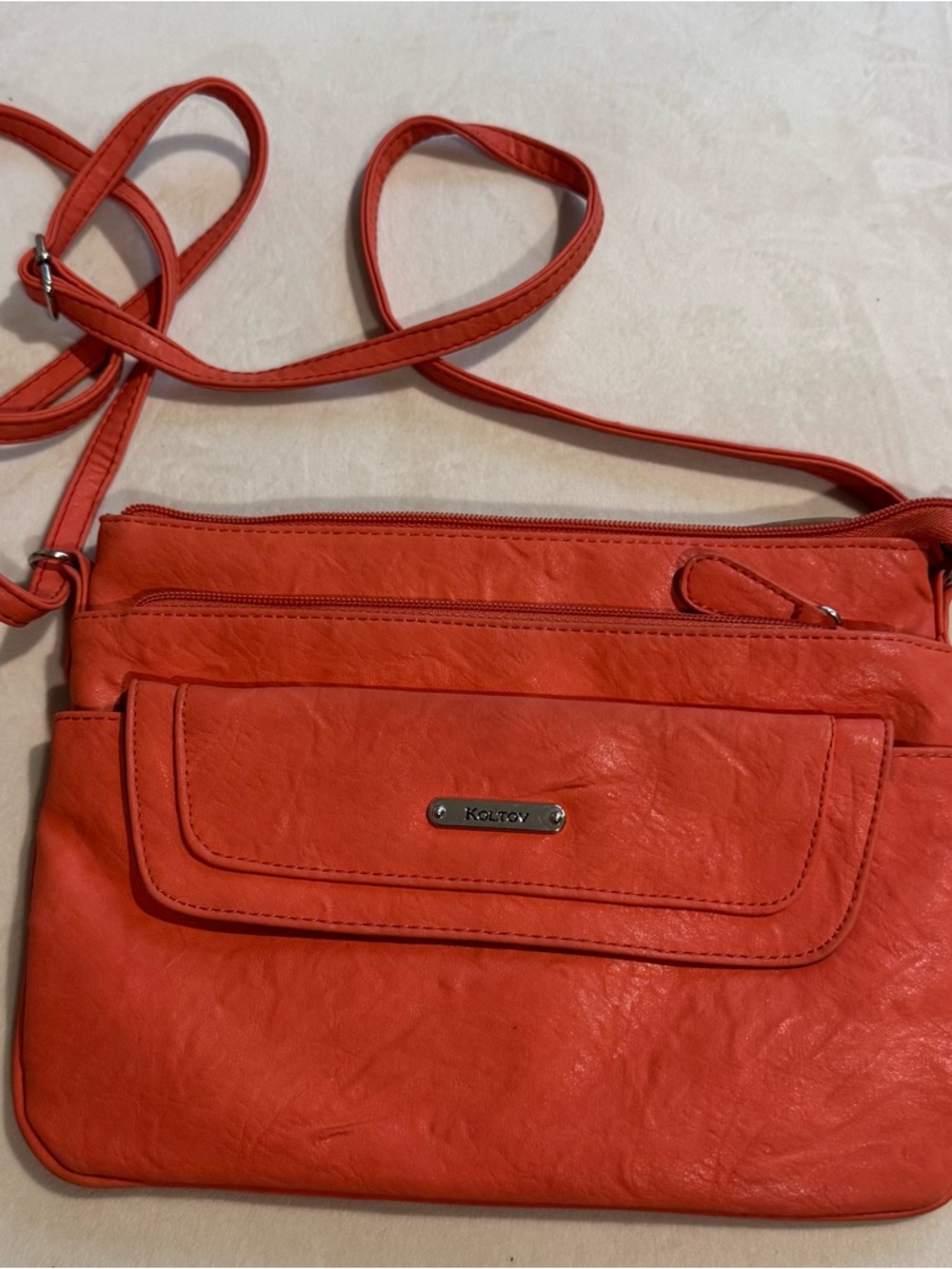 Kolton Orange Crossbody Bag with Multiple Pockets and Storage